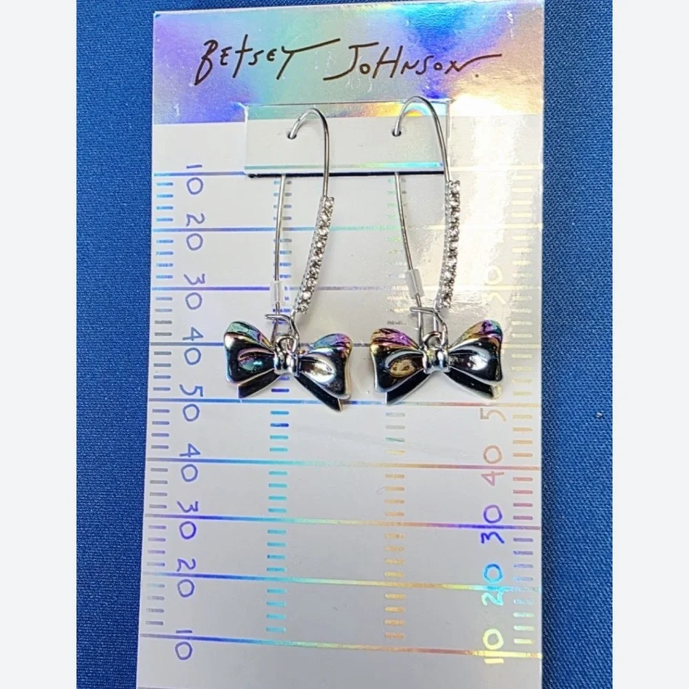 NWT ⚜️🏈⚜️ Betsey Johnson Iridescent Football Bow earrings‎